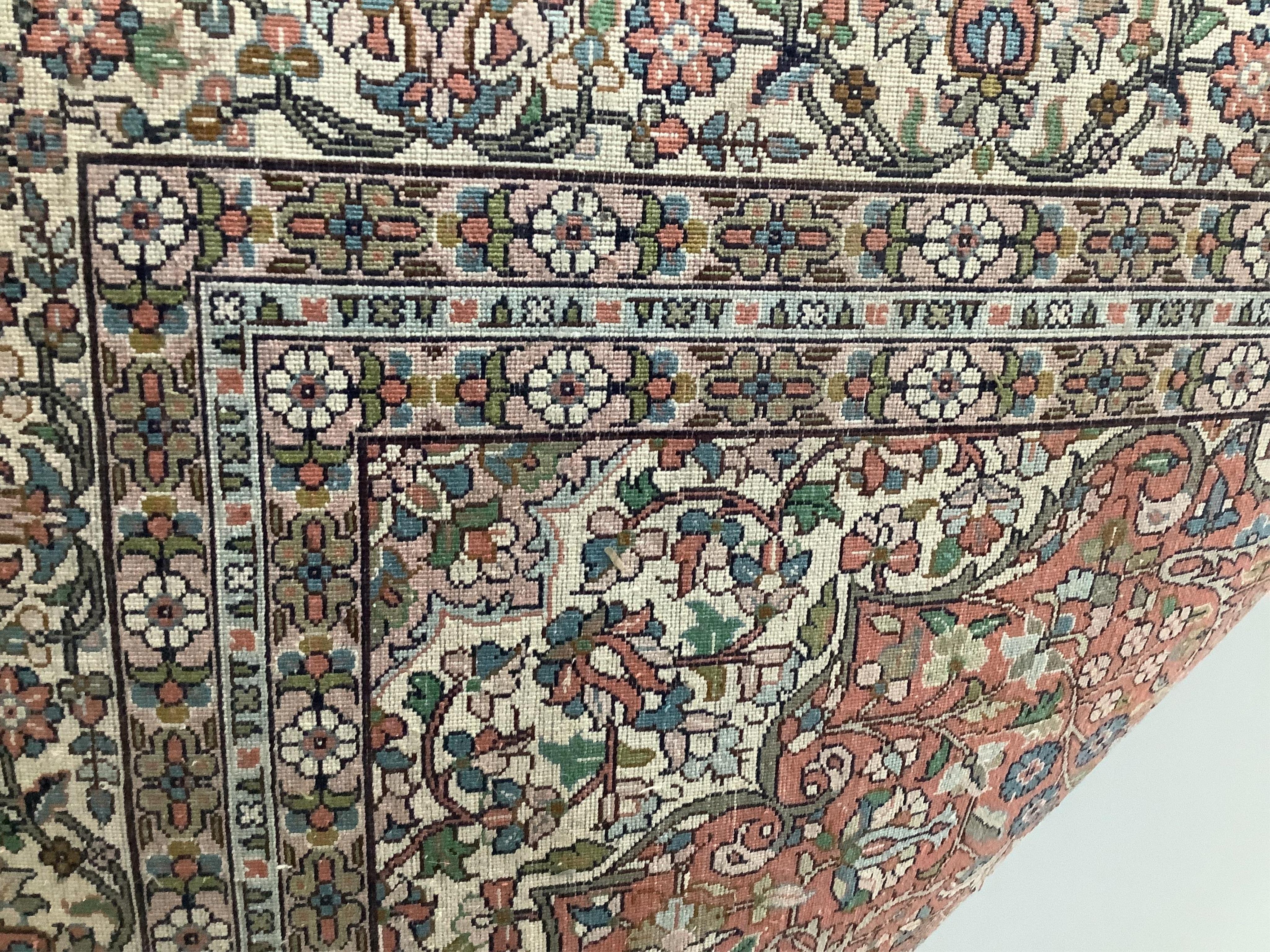 An Indian Persian style rug, 180 x 118cm. Condition - good